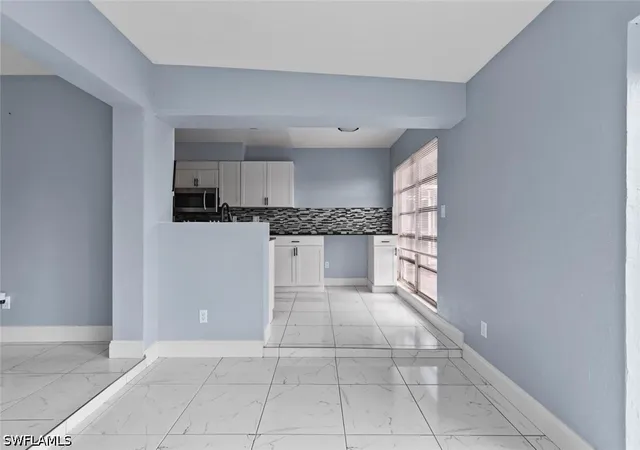 Photo 4 of Single family home for sale at 1681 Country Club Pkwy, Lehigh Acres, FL 33936 | MLS# 226030525 | Listing updated on 2026-09-13