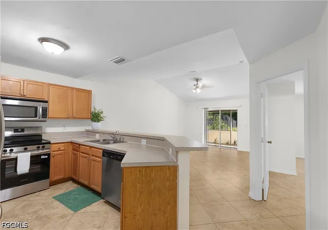 Photo 3 of Sale Pending at 4903 28th St Sw, Lehigh Acres, FL 33973 | MLS# 2026035876 | Listing updated on 2026-09-11