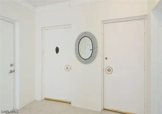 Listing Photo 4 - Condo for sale in building located at 2011 Gulf Shore Blvd N, Naples, FL 34102 - Unit #56