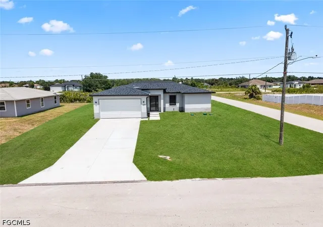 Photo 1 of Single family home for sale at 2700 69th St W, Lehigh Acres, FL 33971 | MLS# 2026035908 | Listing updated on 2026-09-14