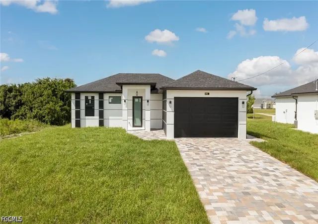 Photo 1 of Sale Pending at 2702 11th St Sw, Lehigh Acres, FL 33976 | MLS# 2026035924 | Listing updated on 2026-10-14