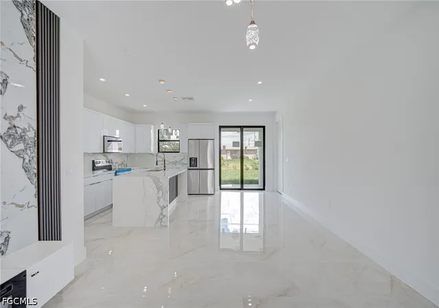 Photo 3 of Sale Pending at 2702 11Th St Sw, Lehigh Acres, FL 33976 | MLS# 2026035924 | Listing updated on 2026-10-14