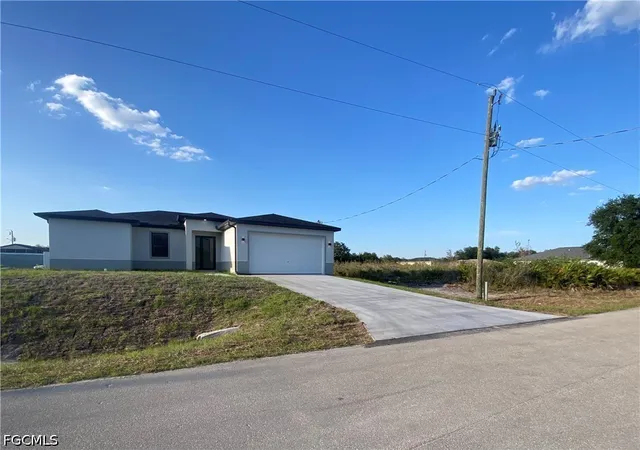 Photo 2 of Single family home for sale at 2614 71st Street W, Lehigh Acres, FL 33971 | MLS# 2026035935 | Listing updated on 2026-09-03