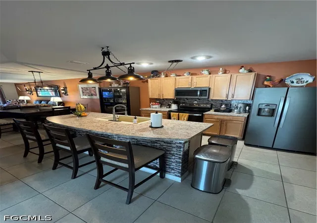 Photo 3 of Townhouse for sale at 10873 Marble Brook Blvd, Lehigh Acres, FL 33936 | MLS# 2026036063 | Listing updated on 2026-09-21
