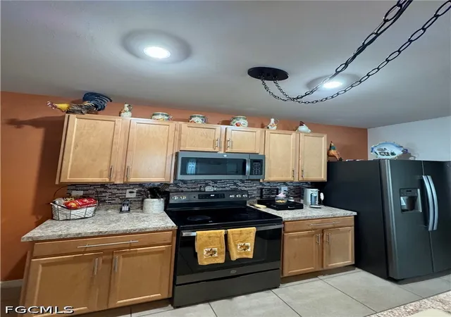 Photo 4 of Townhouse for sale at 10873 Marble Brook Blvd, Lehigh Acres, FL 33936 | MLS# 2026036063 | Listing updated on 2026-09-21