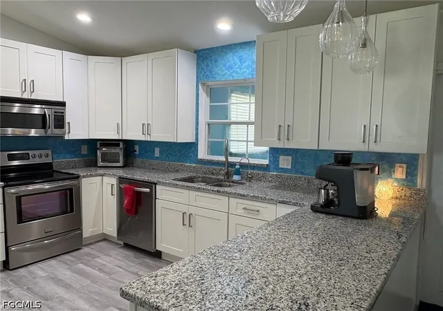 Photo 3 of Single family home for sale at 818 Sw 8th Ct, Cape Coral, FL 33991 | MLS# 2026036219 | Listing updated on 2026-09-16