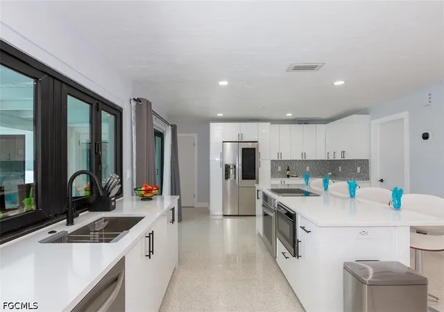 Photo 4 of Sale Pending at 1408 Wellington Ct, Cape Coral, FL 33904 | MLS# 2026036223 | Listing updated on 2026-09-24