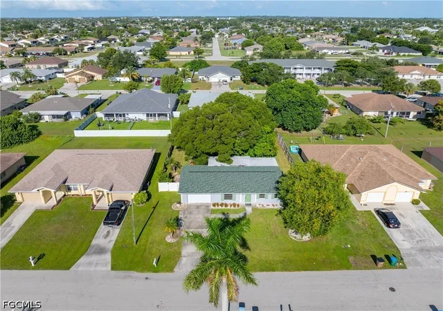 Photo 3 of Single family home for sale at 1402 Se 8th Pl, Cape Coral, FL 33990 | MLS# 2026036263 | Listing updated on 2026-09-14