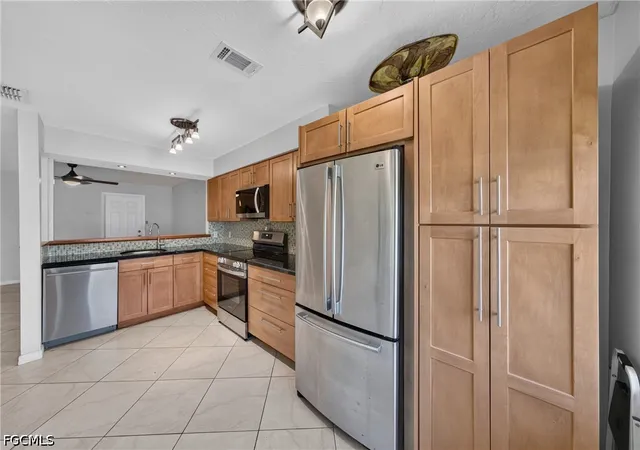 Photo 1 of Townhouse for sale at 13144 Burningtree Ave, Fort Myers, FL 33919 | MLS# 2026036446 | Listing updated on 2026-09-14