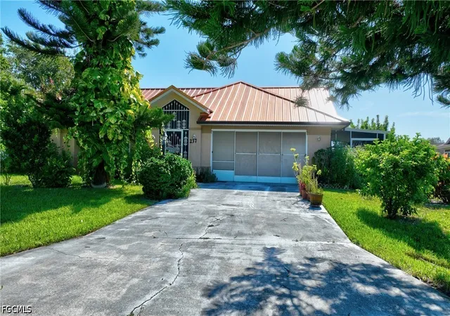 Photo 1 of Single family home for sale at 237 Lauberge Ct, Lehigh Acres, FL 33936 | MLS# 2026036552 | Listing updated on 2026-10-17