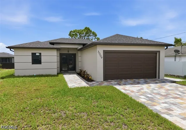 Photo 1 of Single family home for sale at 3009 3rd Street W, Lehigh Acres, FL 33971 | MLS# 2026036589 | Listing updated on 2026-09-11