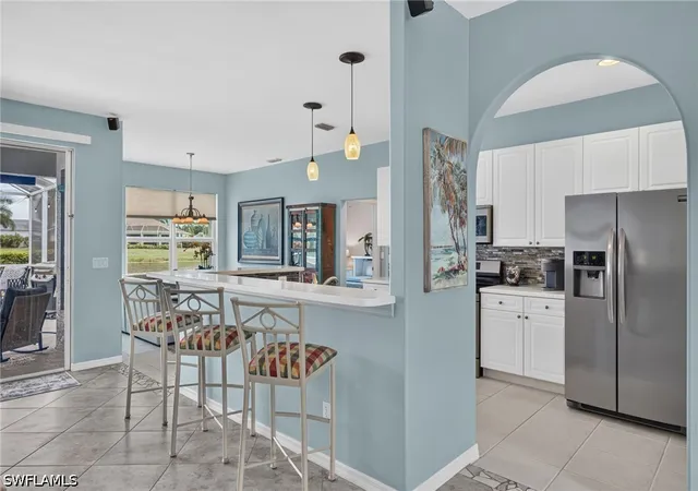 Photo 3 of Single family home for sale at 23410 Olde Meadowbrook Cir, Estero, FL 34134 | MLS# 226031125 | Listing updated on 2026-10-14