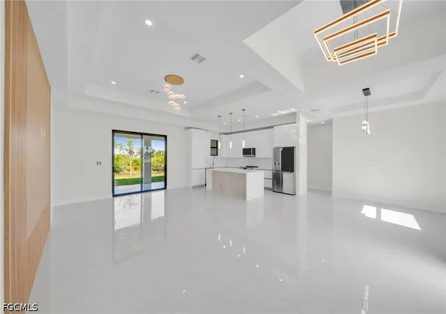 Photo 3 of Single family home for sale at 908 Ne 11th Ave, Cape Coral, FL 33909 | MLS# 2026036661 | Listing updated on 2026-09-11