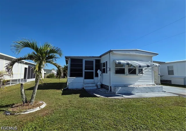 Photo 2 of Manufactured home for sale at 865 Moonlight Dr, North Fort Myers, FL 33917 | MLS# 2026036754 | Listing updated on 2026-10-28