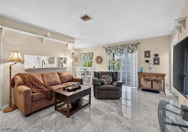 Photo 3 of Townhouse for sale at 3358 Royal Canadian Tr #3, Fort Myers, FL 33907 | MLS# 226030852 | Listing updated on 2026-09-03