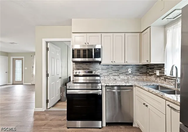 Photo 2 of Sale Pending at 108 Contee Dr, Lehigh Acres, FL 33936 | MLS# 2026036893 | Listing updated on 2026-09-11