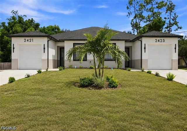 Photo 1 of Multi family home for sale at 2421/2423 Herb Ave S, Lehigh Acres, FL 33973 | MLS# 2026036938 | Listing updated on 2026-09-09