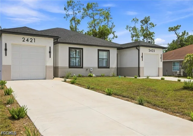 Photo 3 of Multi family home for sale at 2421/2423 Herb Ave S, Lehigh Acres, FL 33973 | MLS# 2026036938 | Listing updated on 2026-09-09