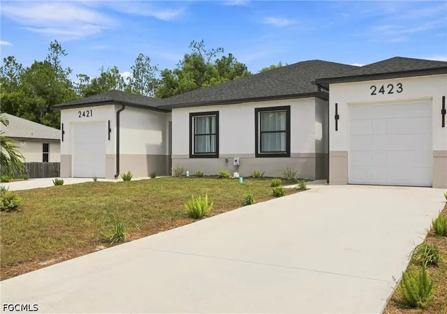Photo 2 of Multi family home for sale at 2421/2423 Herb Ave S, Lehigh Acres, FL 33973 | MLS# 2026036938 | Listing updated on 2026-10-07