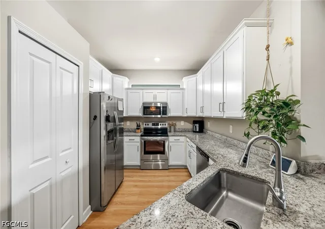 Photo 4 of Townhouse for sale at 14027 Winding Cedar Way, Fort Myers, FL 33913 | MLS# 2026036946 | Listing updated on 2026-09-13