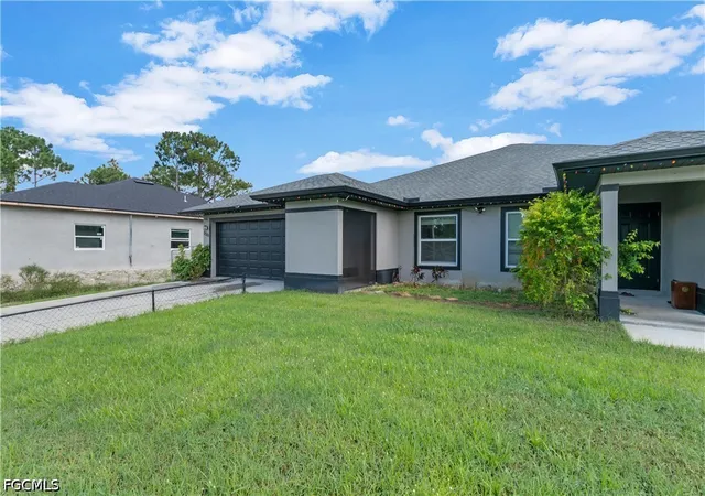 Photo 2 of Multi family home for sale at 5063 Locke Ln, Lehigh Acres, FL 33973 | MLS# 2026036955 | Listing updated on 2026-09-01