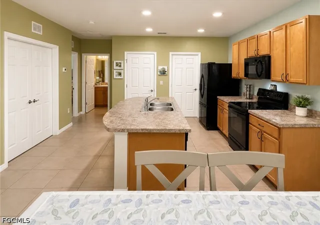 Photo 3 of Townhouse for sale at 10716 Crossback Ln, Lehigh Acres, FL 33936 | MLS# 2026036956 | Listing updated on 2026-09-03