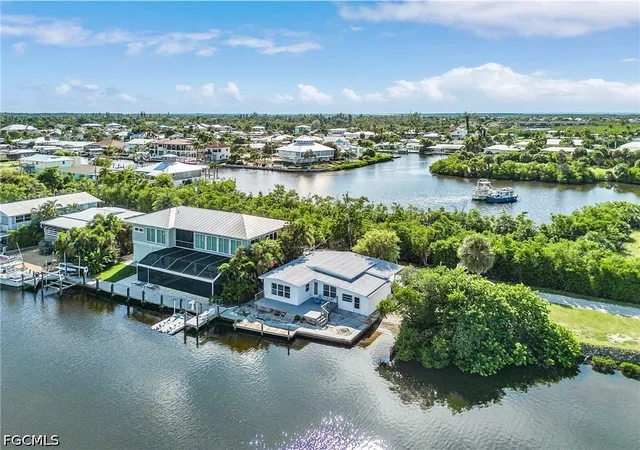 Photo 1 of Single family home for sale at 16376 Antigua Way, Bokeelia, FL 33922 | MLS# 2026036986 | Listing updated on 2026-09-02