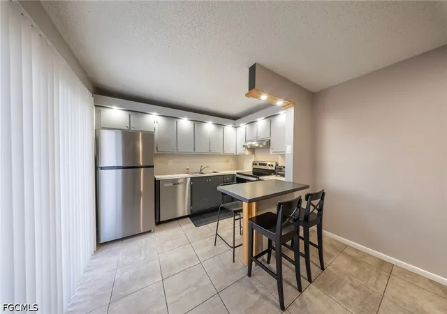 Photo 4 of Townhouse for sale at 1570 Park Meadows Dr #1, Fort Myers, FL 33907 | MLS# 2026037117 | Listing updated on 2026-09-02
