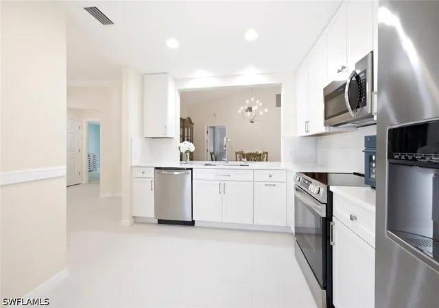 Listing Photo 4 - Condo for sale in building located at 506 Courtside Dr, Naples, FL 34105 - Unit #E201