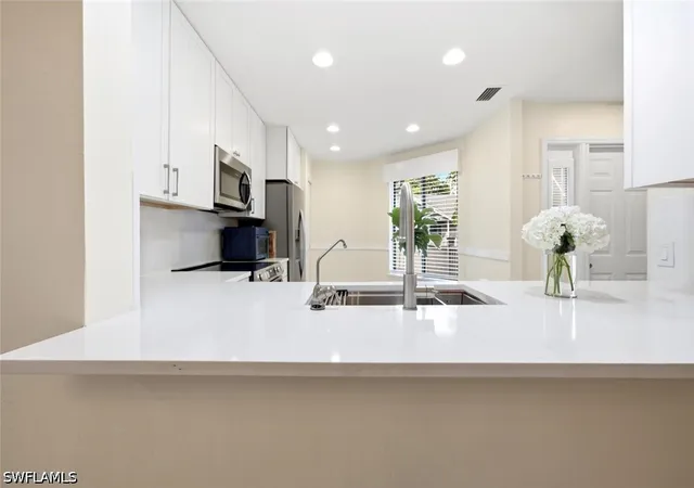 Listing Photo 5 - Condo for sale in building located at 506 Courtside Dr, Naples, FL 34105 - Unit #E201