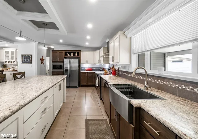 Photo 3 of Manufactured home for sale at 417 Snead Dr, North Fort Myers, FL 33903 | MLS# 2026037186 | Listing updated on 2026-09-04