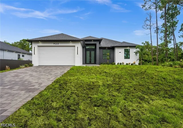 Photo 1 of Single family home for sale at 923 Bolivia Dr, Lehigh Acres, FL 33974 | MLS# 2026037245 | Listing updated on 2026-09-08