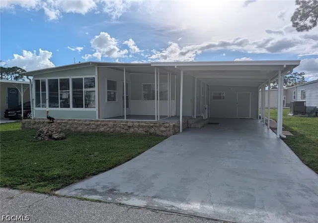 Photo 1 of Manufactured home for sale at 810 Hollyberry Ct, North Fort Myers, FL 33917 | MLS# 2026037254 | Listing updated on 2026-09-09