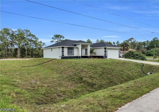 Photo 2 of Single family home for sale at 1012 Clark Ave, Lehigh Acres, FL 33972 | MLS# 2026037280 | Listing updated on 2026-09-10
