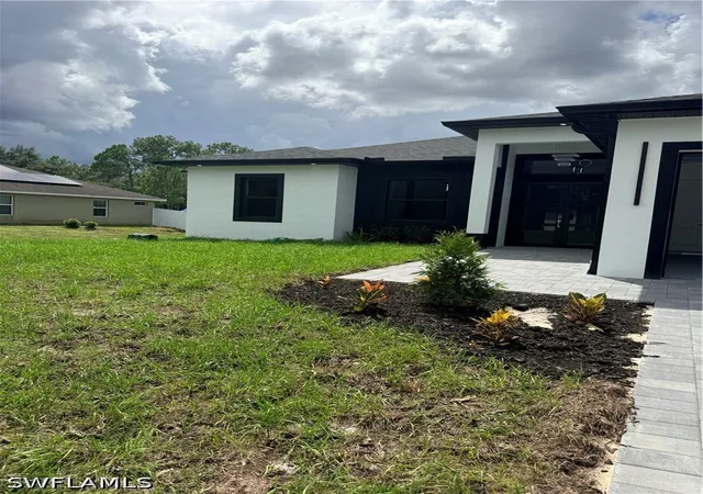 Photo 3 of Single family home for sale at 1409 Roosevelt Ave, Lehigh Acres, FL 33972 | MLS# 226031817 | Listing updated on 2026-09-11