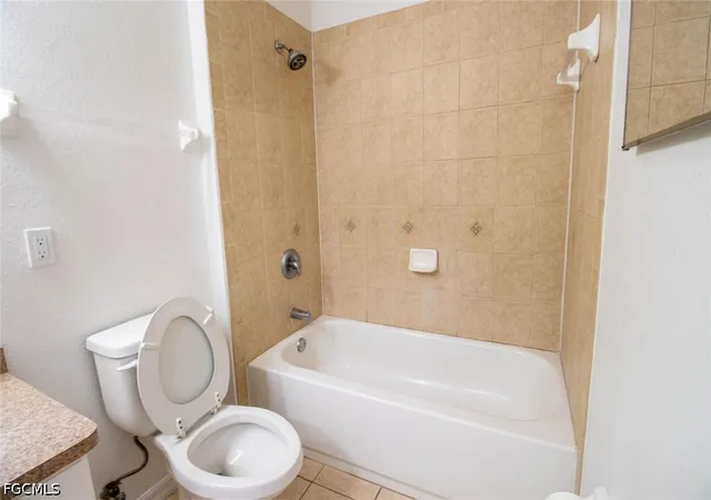 Listing Photo 5 - Condo for sale in building located at 1500/1502 W 12th St, Lehigh Acres, FL 33972