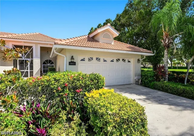Photo 1 of Townhouse for sale at 8681 Mustang Dr, Naples, FL 34113 | MLS# 226031843 | Listing updated on 2026-09-13