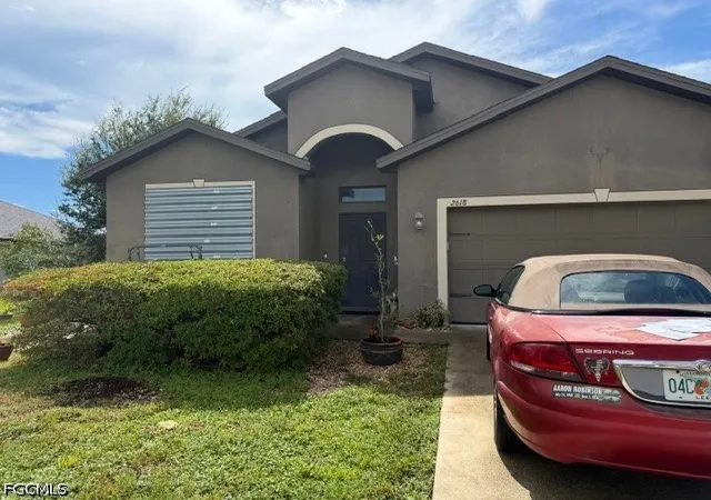 Photo 1 of Single family home for sale at 2618 Sw 21st Place, Cape Coral, FL 33914 | MLS# 2026037335 | Listing updated on 2026-09-11
