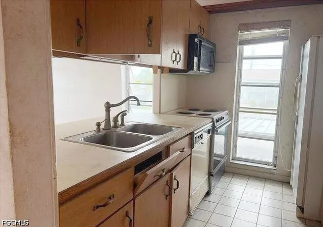Photo 4 of Condo for sale at 330 Tudor Dr #203, Cape Coral, FL 33904 | MLS# 2026037368 | Listing updated on 2026-09-03