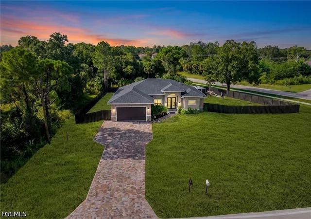 Photo 1 of Single family home for sale at 810 Sentinela Blvd, Lehigh Acres, FL 33974 | MLS# 2026037413 | Listing updated on 2026-10-20