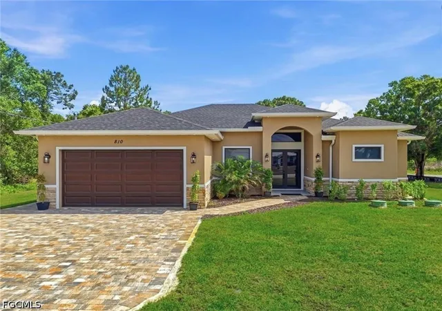 Photo 2 of Single family home for sale at 810 Sentinela Blvd, Lehigh Acres, FL 33974 | MLS# 2026037413 | Listing updated on 2026-09-30