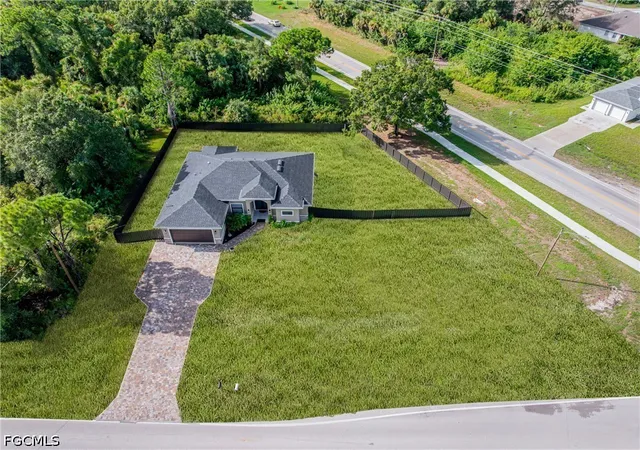 Photo 3 of Single family home for sale at 810 Sentinela Blvd, Lehigh Acres, FL 33974 | MLS# 2026037413 | Listing updated on 2026-09-30
