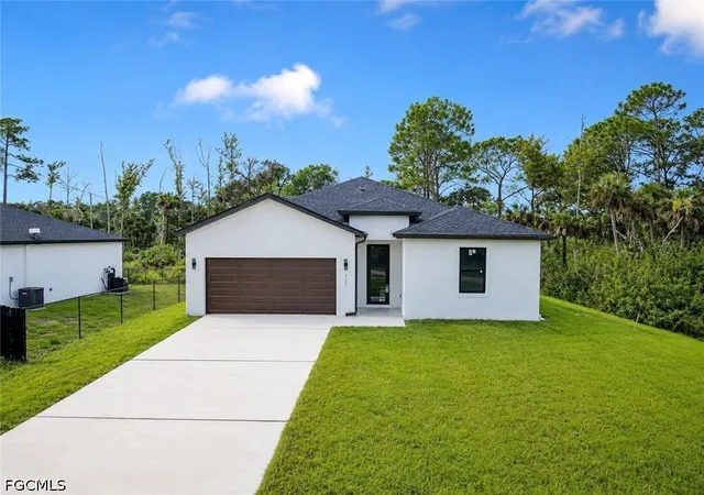 Photo 1 of Single family home for sale at 621 Greenbriar Blvd, Lehigh Acres, FL 33972 | MLS# 2026037448 | Listing updated on 2026-09-09