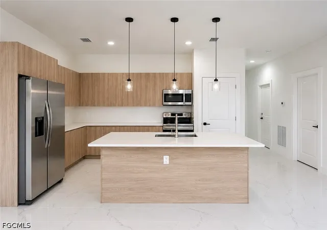 Photo 2 of Single family home for sale at 621 Greenbriar Blvd, Lehigh Acres, FL 33972 | MLS# 2026037448 | Listing updated on 2026-09-09