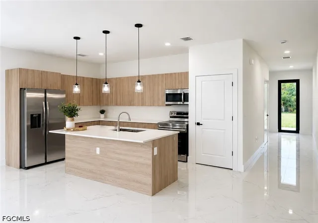 Photo 3 of Single family home for sale at 621 Greenbriar Blvd, Lehigh Acres, FL 33972 | MLS# 2026037448 | Listing updated on 2026-09-09