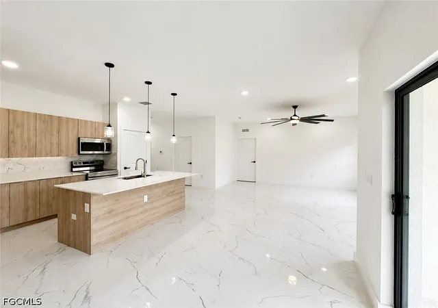 Photo 4 of Single family home for sale at 621 Greenbriar Blvd, Lehigh Acres, FL 33972 | MLS# 2026037448 | Listing updated on 2026-09-09