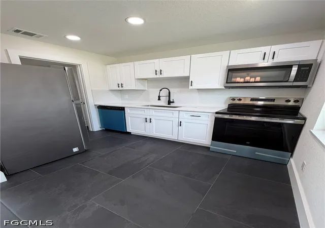 Photo 3 of Single family home for sale at 124 Andros St, Lehigh Acres, FL 33936 | MLS# 2026037461 | Listing updated on 2026-09-04