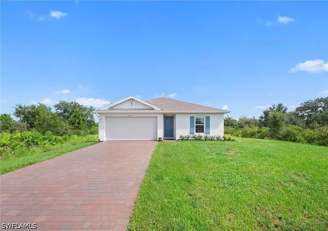 Photo 2 of Single family home for sale at 544 Woodview Dr, Lehigh Acres, FL 33972 | MLS# 226031839 | Listing updated on 2026-09-07