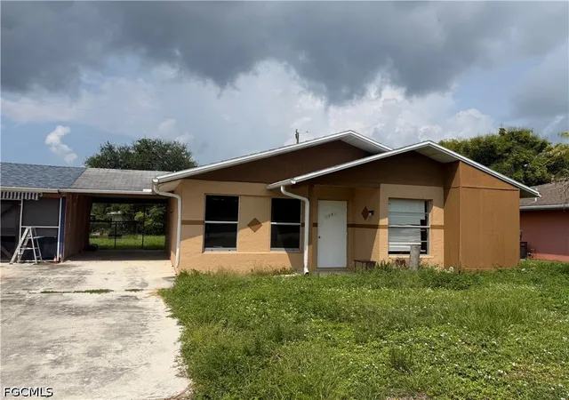 Photo 1 of Townhouse for sale at 1123 Joel Blvd, Lehigh Acres, FL 33936 | MLS# 2026037535 | Listing updated on 2026-09-04