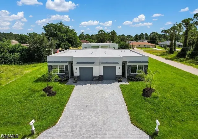 Photo 1 of Multi family home for sale at 5013 5015 24th Street Sw, Lehigh Acres, FL 33973 | MLS# 2026037566 | Listing updated on 2026-09-09